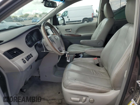 2013 Toyota Sienna XLE AAS with VIN 5TDYK3DC7DS389872, listed as a Copart auction lot 66072995 with 95,797 mi miles and Clean title. Bid and sale history available at DreamBid. Image 7.