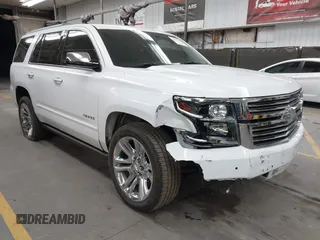 2020 Chevrolet Tahoe Premier with VIN 1GNSKCKJ3LR193830, listed as a IAAI auction lot 42476342 with 72,405 mi miles and . Bid and sale history available at DreamBid. Image 1.
