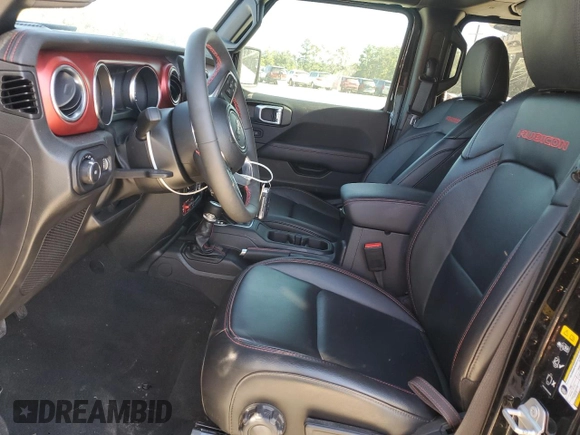 2023 Jeep Wrangler Rubicon z VIN 1C4HJXFN2PW617435, wystawiony jako Copart lot #75409114 z przebiegiem 12 185 mil mil oraz Szkoda całkowita • Salvage title. Historia ofert i sprzedaży dostępna na DreamBid. Obrazek 7.