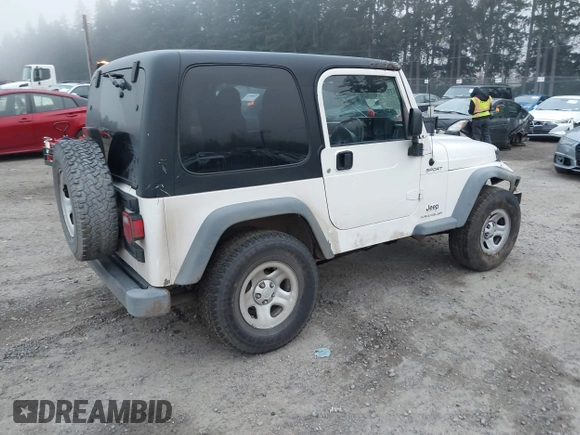2006 Jeep Wrangler Sport Right Hand Drive with VIN 1J4F449S16P709895, listed as a IAAI auction lot 41349311 with 157,125 mi miles. Bid and sale history available at carsss.com. Image 4.
