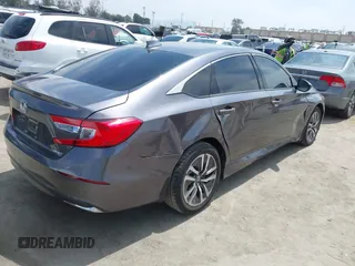 2020 Honda Accord with VIN 1HGCV3F11LA015901, listed as a IAAI auction lot 42022659 with 131,865 mi miles and . Bid and sale history available at DreamBid. Image 4.