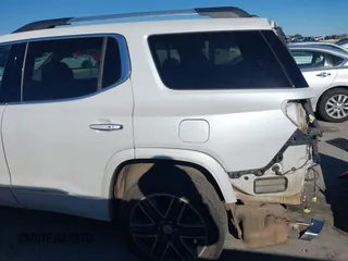 2019 GMC Acadia Denali with VIN 1GKKNPLS0KZ114003, listed as a IAAI auction lot 41246360 with 129,239 mi miles and . Bid and sale history available at carsss.com. Image 18.