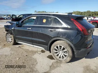 2020 Cadillac XT4 FWD Premium Luxury with VIN 1GYFZCR4XLF070463, listed as a Copart auction lot 47870865 with 88,406 mi miles and Non Repairable. Bid and sale history available at carsss.com. Image 2.