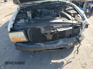 2000 GMC Jimmy SLE Convenience with VIN 1GKDT13W5Y2200634, listed as a Copart auction lot 69860014 with 172,179 mi miles and Salvage Title. Bid and sale history available at carsss.com. Image 11.