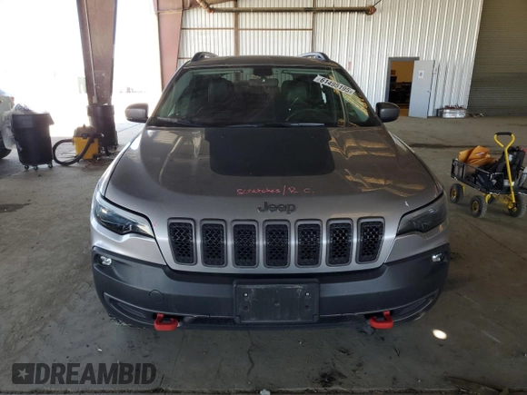 2019 Jeep Cherokee Trailhawk с VIN 1C4PJMBX0KD362032, выставлен на аукционе Copart как лот 61495195 с пробегом 49 028 миль миль и Списание • Salvage title. История ставок и продаж доступна на DreamBid. Изображение 5.