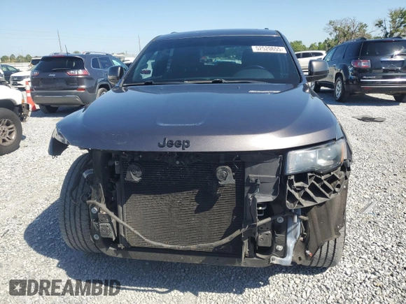 2017 Jeep Grand Cherokee 75th Anniversary with VIN 1C4RJEAG4HC700191, listed as a Copart auction lot 52520655 with 130,828 mi miles and Salvage title. Bid and sale history available at DreamBid. Image 5.