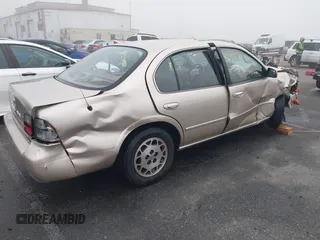 1995 Nissan Maxima GLE z VIN JN1CA21DXST075946, wystawiony jako IAAI lot #41669451 z przebiegiem 154 423 mil mil oraz . Historia ofert i sprzedaży dostępna na DreamBid. Obrazek 4.