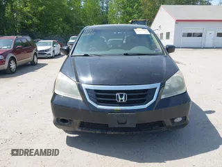 2009 Honda Odyssey Touring с VIN 5FNRL38999B018272, выставлен на аукционе IAAI как лот 42412203 с пробегом 154 987 миль миль и . История ставок и продаж доступна на DreamBid. Изображение 13.