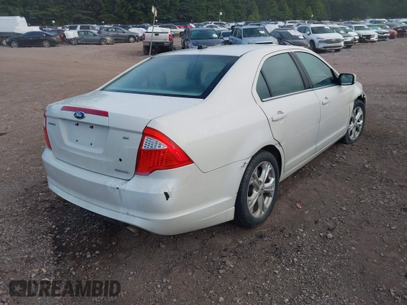 2012 Ford Fusion SE z VIN 3FAHP0HG3CR445925, wystawiony jako IAAI lot #42664342 z przebiegiem 194 798 mil mil oraz . Historia ofert i sprzedaży dostępna na DreamBid. Obrazek 4.