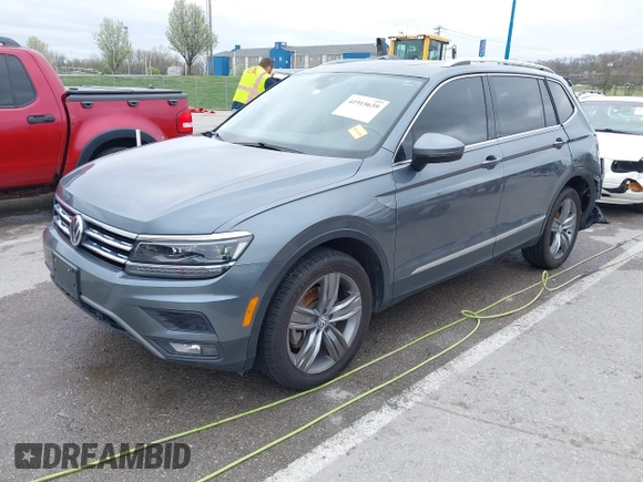 2019 Volkswagen Tiguan SEL Premium with VIN 3VV4B7AX9KM095580, listed as a IAAI auction lot 41915639 with 67,440 mi miles and . Bid and sale history available at DreamBid. Image 18.