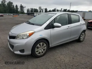 2012 Toyota Yaris L with VIN JTDKTUD36CD525945, listed as a Copart auction lot 62104075 with 159,830 mi miles and Salvage title. Bid and sale history available at DreamBid. Image 1.