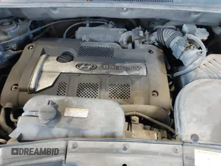 2006 Hyundai Tucson GL with VIN KM8JM12B96U252484, listed as a IAAI auction lot 42100855 with 273,655 mi miles. Bid and sale history available at carsss.com. Image 10.
