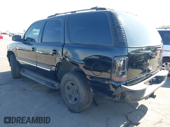 2004 Chevrolet Tahoe LS with VIN 1GNEC13T94J331286, listed as a IAAI auction lot 40691697 with 211,544 mi miles. Bid and sale history available at carsss.com. Image 3.