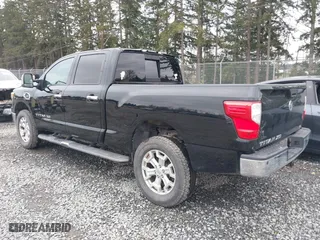 2016 Nissan Titan XD Platinum Reserve with VIN 1N6BA1F2XGN502660, listed as a IAAI auction lot 41731577 with 118,581 mi miles. Bid and sale history available at carsss.com. Image 3.