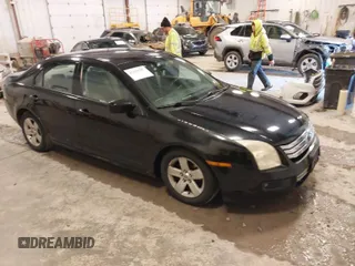 2007 Ford Fusion SE with VIN 3FAHP07147R177289, listed as a IAAI auction lot 41953287 with 218,656 mi miles. Bid and sale history available at carsss.com. Image 1.