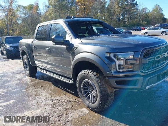 2020 Ford F-150 Raptor with VIN 1FTFW1RG7LFB08650, listed as a IAAI auction lot 40992485 with 102,115 mi miles and . Bid and sale history available at carsss.com. Image 1.