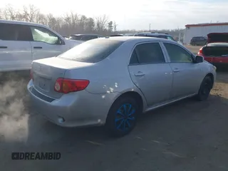 2010 Toyota Corolla with VIN 1NXBU4EE5AZ217378, listed as a IAAI auction lot 41402973 with 130,303 mi miles. Bid and sale history available at carsss.com. Image 4.