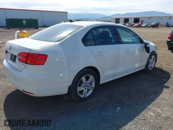2012 Volkswagen Jetta TDI w/Premium & Nav with VIN 3VWLL7AJXCM426846, listed as a IAAI auction lot 42492125 with 127,342 mi miles and . Bid and sale history available at DreamBid. Image 4.