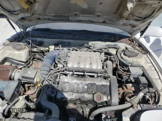 1991 Mitsubishi 3000GT z VIN JA3XD64B4MY014247, wystawiony jako Copart lot #76901044 z przebiegiem 208 743 mil mil oraz Tytuł czysty. Historia ofert i sprzedaży dostępna na DreamBid. Obrazek 11.