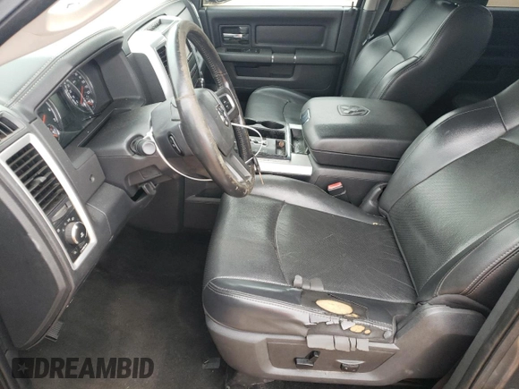 2010 Dodge 1500 SLT z VIN 1D7RB1CT9AS178725, wystawiony jako Copart lot #55848615 z przebiegiem 198 349 mil mil oraz Szkoda całkowita • Salvage title. Historia ofert i sprzedaży dostępna na DreamBid. Obrazek 7.