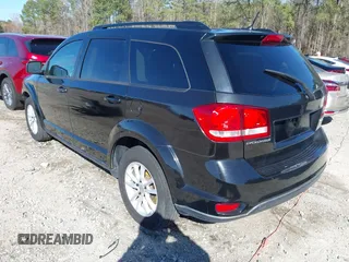 2015 Dodge Journey SXT with VIN 3C4PDCBB2FT531344, listed as a IAAI auction lot 41863170 with 168,488 mi miles. Bid and sale history available at carsss.com. Image 3.