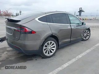 2016 Tesla Model X 70D with VIN 5YJXCBE22GF017499, listed as a IAAI auction lot 42192962 with 103,430 mi miles and . Bid and sale history available at DreamBid. Image 4.