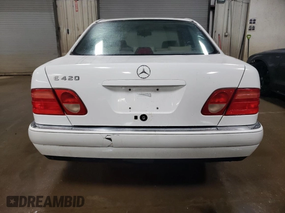 1997 Mercedes-Benz E-Class with VIN WDBJF72F6VA263199, listed as a Copart auction lot 43445715 with 121,444 mi miles and Salvage Title. Bid and sale history available at carsss.com. Image 6.
