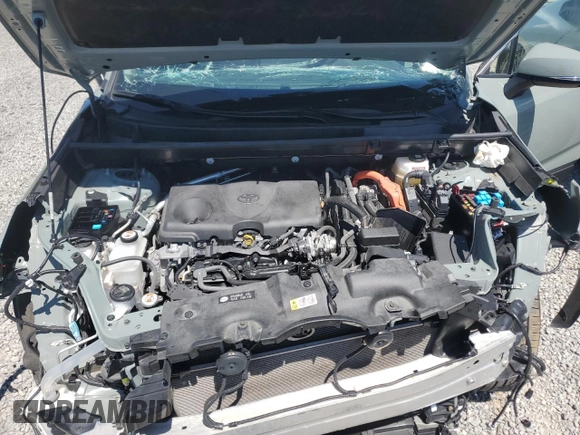 2023 Toyota RAV4 Hybrid XLE z VIN JTMRWRFV8PD206165, wystawiony jako Copart lot #58083135 z przebiegiem 27 023 mil mil oraz Szkoda całkowita • Salvage title. Historia ofert i sprzedaży dostępna na DreamBid. Obrazek 12.