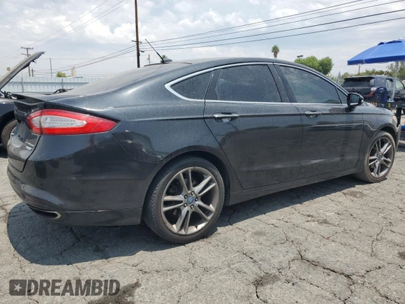 2013 Ford Fusion Titanium with VIN 3FA6P0K98DR103180, listed as a Copart auction lot 59403085 with 184,087 mi miles and Salvage title. Bid and sale history available at DreamBid. Image 3.