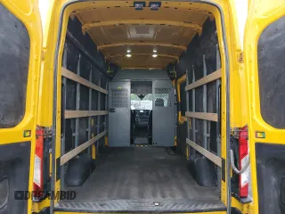 2021 Ford Transit Cargo с VIN 1FTBR1X83MKA24724, выставлен на аукционе Copart как лот 60577755 с пробегом 122 675 миль миль и Списание • Salvage title. История ставок и продаж доступна на DreamBid. Изображение 10.
