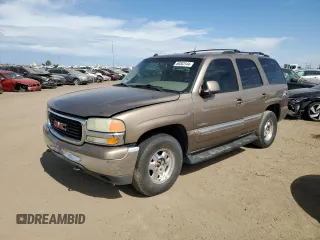 2003 GMC Yukon SLT with VIN 1GKEK13Z43R219290, listed as a Copart auction lot 69303144 with 299,023 mi miles and Salvage Title. Bid and sale history available at carsss.com. Image 1.