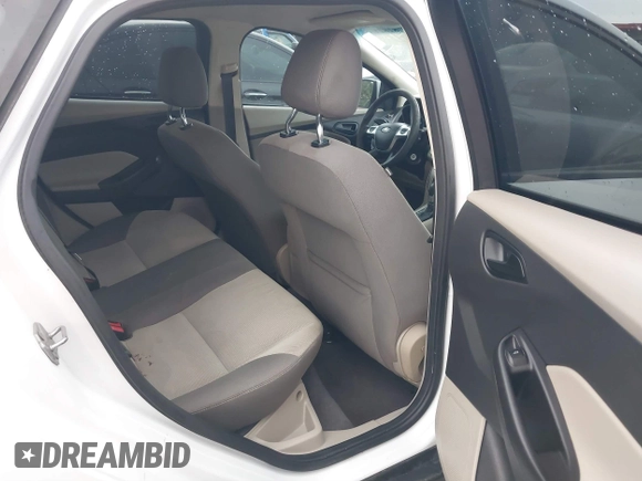 2012 Ford Focus SE z VIN 1FAHP3F29CL141649, wystawiony jako IAAI lot #40782821 z przebiegiem 266 683 mil mil oraz . Historia ofert i sprzedaży dostępna na DreamBid. Obrazek 8.