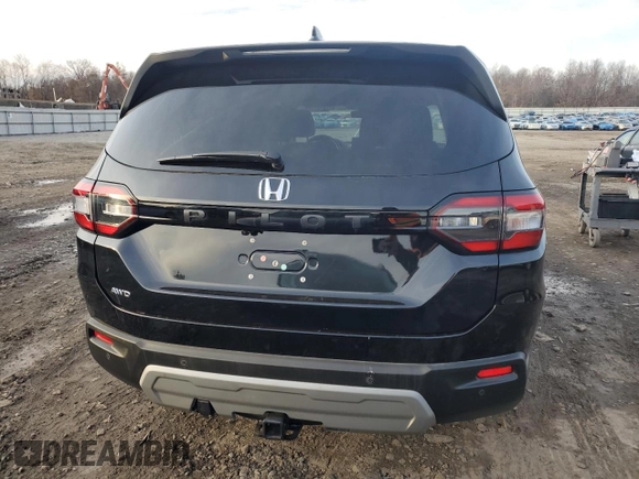 2024 Honda Pilot EX-L 7 Passenger with VIN 5FNYG1H51RB019899, listed as a Copart auction lot 82653994 with 7,399 mi miles and Salvage Title. Bid and sale history available at carsss.com. Image 6.