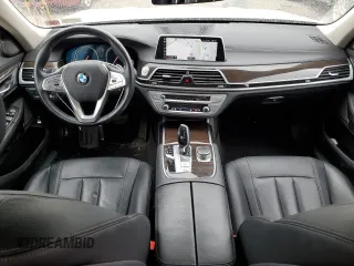 2018 BMW 7 Series 740i xDrive with VIN WBA7E4C56JGV23835, listed as a Copart auction lot 55254573 with 103,713 mi miles. Bid and sale history available at carsss.com. Image 8.
