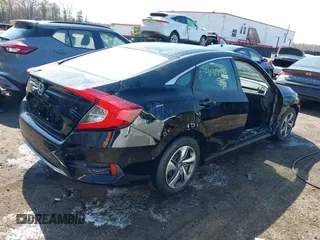 2020 Honda Civic LX with VIN 2HGFC2F69LH532499, listed as a IAAI auction lot 41919941 with 96,936 mi miles and . Bid and sale history available at DreamBid. Image 4.