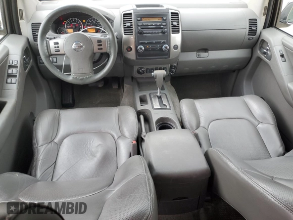2011 Nissan Frontier Pro-4X with VIN 1N6AD0EVXBC433028, listed as a Copart auction lot 57653305 with 144,753 mi miles and Salvage title. Bid and sale history available at DreamBid. Image 8.
