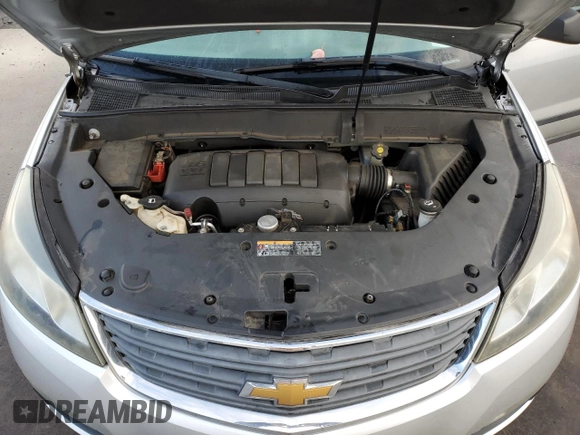 2013 Chevrolet Traverse LS with VIN 1GNKVFKD0DJ196025, listed as a Copart auction lot 82359024 with 121,414 mi miles and Salvage Title. Bid and sale history available at DreamBid. Image 12.
