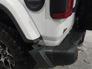 2021 Jeep Wrangler Unlimited Rubicon with VIN 1C4HJXFN2MW809904, listed as a IAAI auction lot 41567956 with 34,000 mi miles and . Bid and sale history available at DreamBid. Image 17.