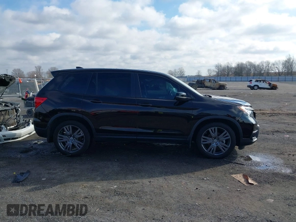 2021 Honda Passport EX-L with VIN 5FNYF7H56MB009450, listed as a IAAI auction lot 41474645 with 91,140 mi miles. Bid and sale history available at carsss.com. Image 13.