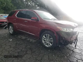 2018 Chevrolet Traverse High Country with VIN 1GNEVKKW7JJ250813, listed as a Copart auction lot 58981395 with 145,170 mi miles and Salvage title. Bid and sale history available at DreamBid. Image 4.