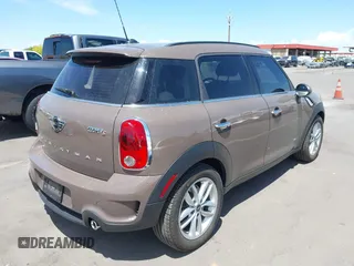 2013 MINI Countryman S ALL4 with VIN WMWZC5C54DWP34224, listed as a IAAI auction lot 42141400 with 33,307 mi miles and . Bid and sale history available at DreamBid. Image 4.