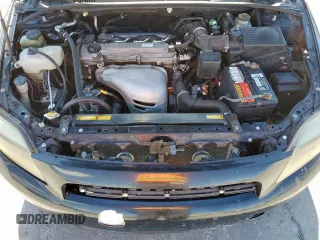 2005 Scion tC z VIN JTKDE177350049415, wystawiony jako Copart lot #59777735 z przebiegiem 272 617 mil mil oraz Szkoda całkowita • Salvage title. Historia ofert i sprzedaży dostępna na DreamBid. Obrazek 11.