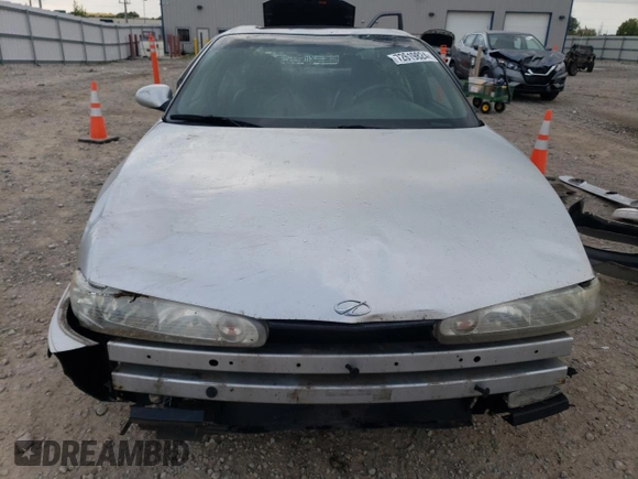 2000 Oldsmobile Intrigue GLS z VIN 1G3WX52H0YF233648, wystawiony jako Copart lot #72619824 z przebiegiem Nie podano mil oraz Nie do naprawy. Historia ofert i sprzedaży dostępna na DreamBid. Obrazek 5.