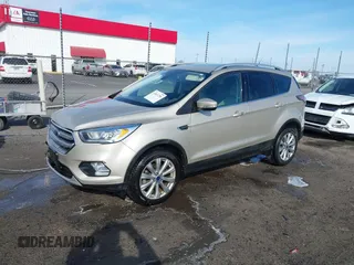 2017 Ford Escape Titanium with VIN 1FMCU0JD3HUB19602, listed as a IAAI auction lot 41816296 with 70,311 mi miles. Bid and sale history available at carsss.com. Image 2.
