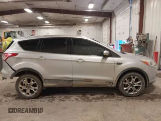 2013 Ford Escape SEL with VIN 1FMCU0H98DUC72150, listed as a IAAI auction lot 41213748 with 136,323 mi miles. Bid and sale history available at carsss.com. Image 12.