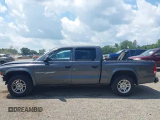 2001 Dodge Dakota with VIN 1B7HL2AX01S338909, listed as a IAAI auction lot 42639655 with 111,858 mi miles and . Bid and sale history available at DreamBid. Image 15.