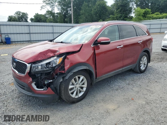 2017 Kia Sorento LX z VIN 5XYPG4A38HG237626, wystawiony jako Copart lot #57173035 z przebiegiem 141 417 mil mil oraz Szkoda całkowita • Salvage title. Historia ofert i sprzedaży dostępna na DreamBid. Obrazek 1.