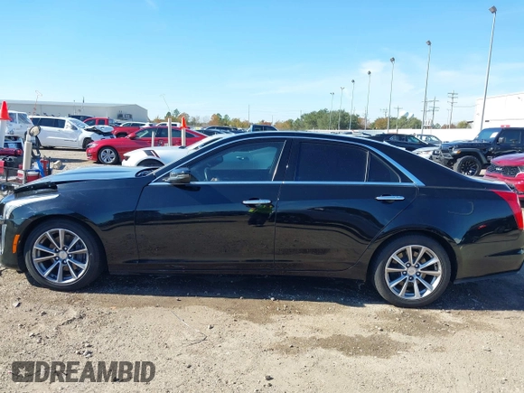 2017 Cadillac CTS Luxury RWD with VIN 1G6AR5SS3H0195046, listed as a IAAI auction lot 41081829 with 120,097 mi miles and . Bid and sale history available at DreamBid. Image 14.