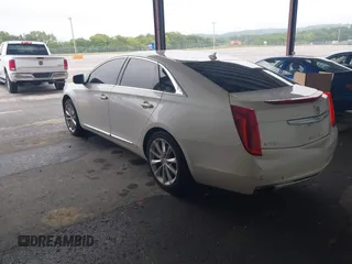 2014 Cadillac XTS Luxury with VIN 2G61M5S31E9210460, listed as a IAAI auction lot 41602087 with 1 mi miles. Bid and sale history available at carsss.com. Image 3.