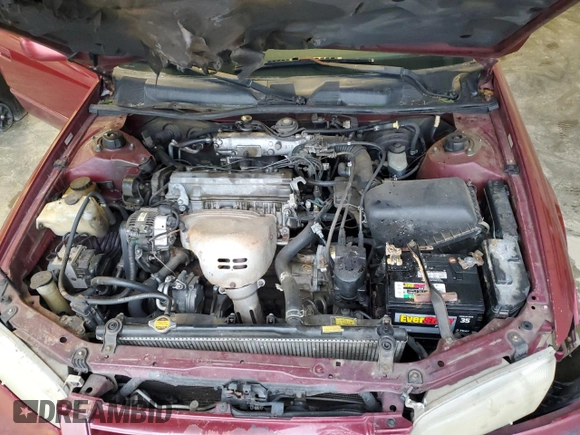 1997 Toyota Camry LE z VIN 4T1BG22K1VU033230, wystawiony jako Copart lot #52619265 z przebiegiem 301 543 mil mil oraz Szkoda całkowita • Salvage title. Historia ofert i sprzedaży dostępna na DreamBid. Obrazek 12.